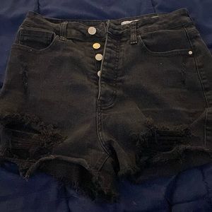 Black jean shorts with rips